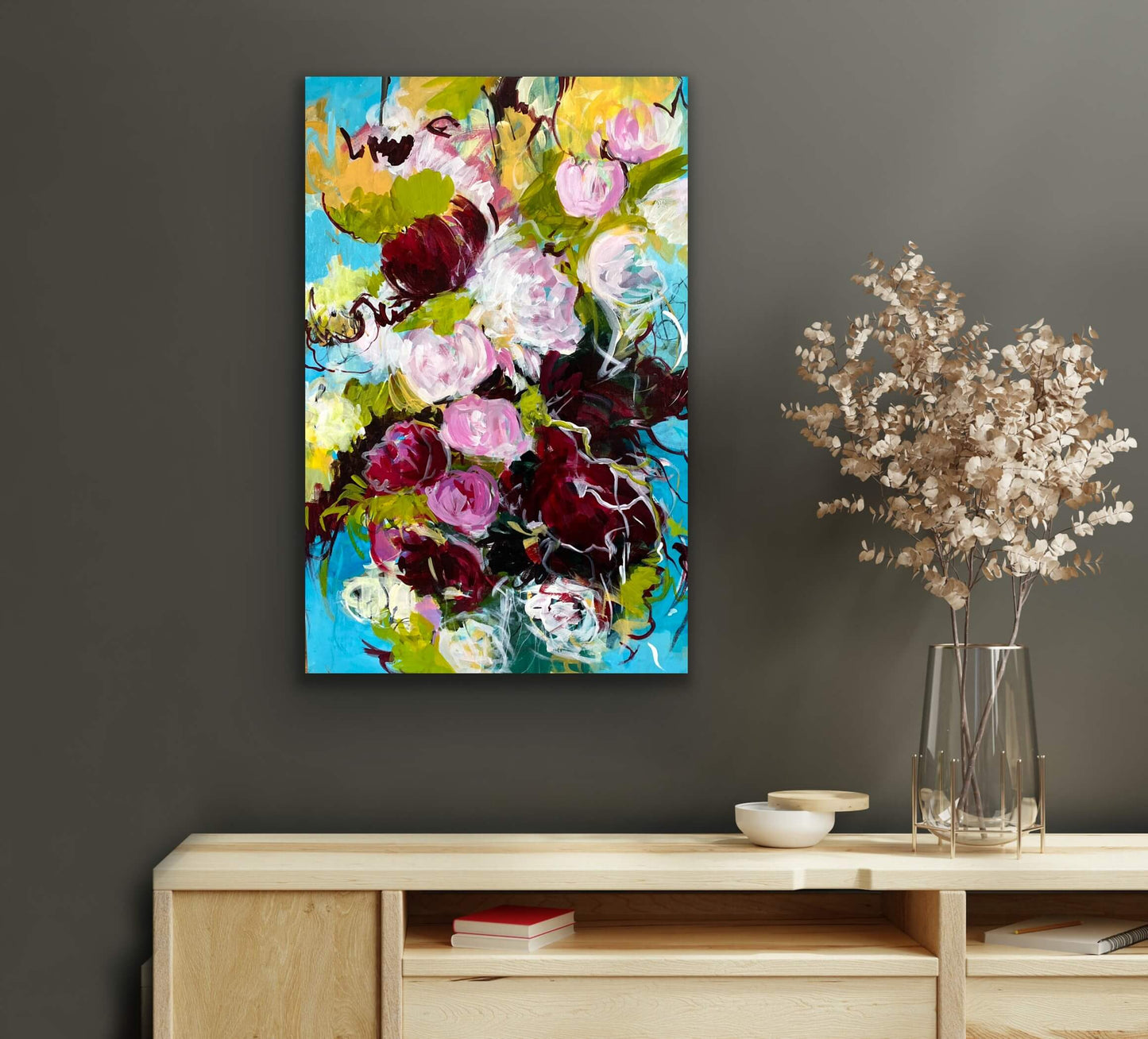 Blue floral painting on dark wall